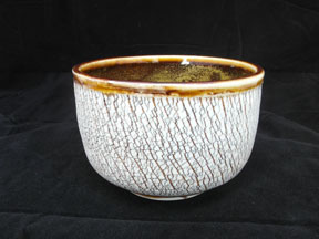 Tea Cup, Golden Temoku on Dove porcelain